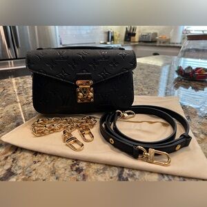 Black Designer Crossbody Bag with Gold Accents